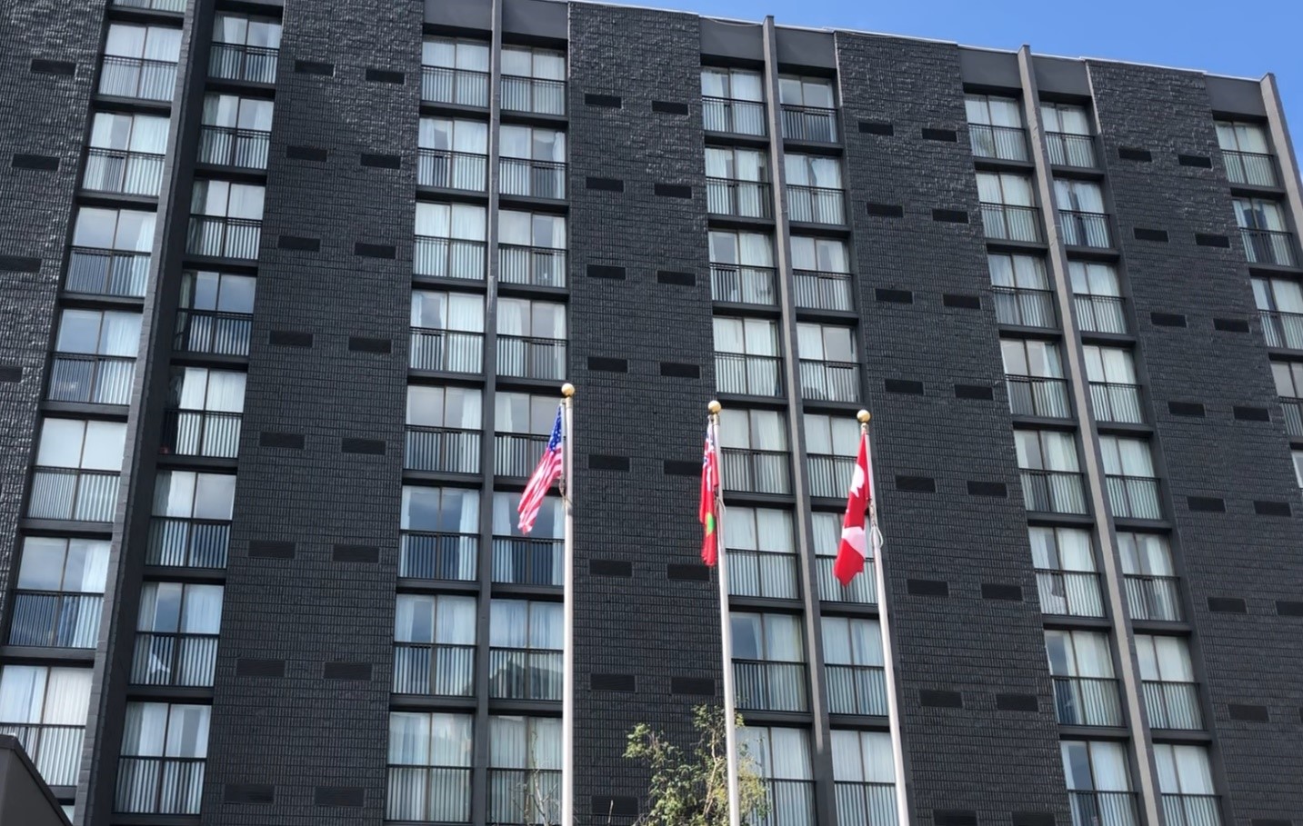 The outside of a hotel in Toronto being used as an emergency shelter.